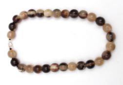 Modern large horn bead necklace, a single row of 29 polished uniform horn beads, 20mm diam, to a