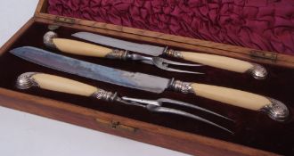 Victorian silver mounted and ivory handled cased four-piece carving set, each with scrolling