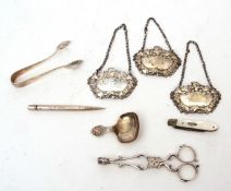 Mixed Lot: Elizabeth II caddy spoon together with a pair of small sugar tongs, silver bladed and