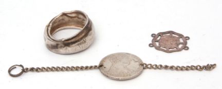 Mixed Lot: base metal coin bracelet together with a further Indian one anna coin pendant and a