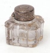 George V silver lidded and clear moulded glass inkwell, the lobed clear glass body with plain