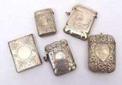 Mixed Lot: five various base metal vesta cases, each of rectangular form with hinged covers and