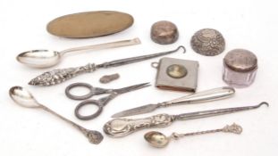 Mixed Lot: silver lidded and clear glass rouge pot, four various silver mounted dressing table