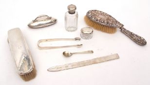 Mixed Lot: Elizabeth II silver letter opener, together with two various silver backed brushes (one