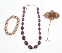 Mixed Lot: antique gilt metal brooch, metal large curb link bracelet, together with a purple