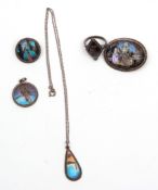 Mixed Lot: white metal and butterfly wing decorated jewellery to include oval brooch, tear drop