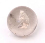 19th century clear glass marble, centred with a sulphide depicting the Warwickshire bear (external