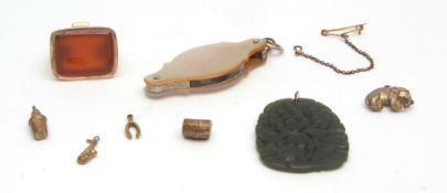 Mixed Lot: carved jadeite pendant; Georgian fob seal having a cornelian matrix; antique mother of