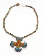 Vintage beaded cross pendant suspended from a multi-coloured small bead chain, 40 x 40mm,
