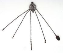 Edwardian gun metal chatelaine with two chains hanging, having a acorn shaped pin cushion on one,