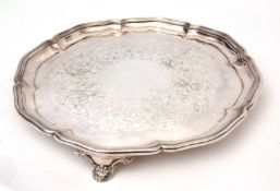 Mid-19th century electro-plated salver of shaped circular form with applied rim, foliate chased