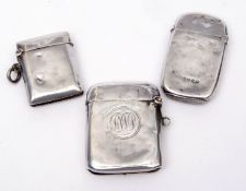Mixed Lot: three various hallmarked silver vesta cases, each of rectangular form with hinged and