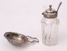 Mixed Lot: Elizabeth II lemon strainer of shaped circular form with pierced bowl and applied side