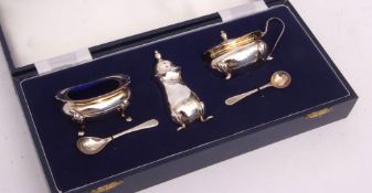 Elizabeth II cased three-piece cruet set comprising open salt, lidded mustard and pepper caster, all