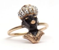 Vintage yellow metal and enamel blackamoor ring, the figure decorated with white and black enamel