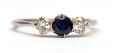 Early 20th century precious metal sapphire and diamond ring, the central circular cut faceted