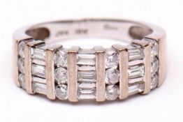 Precious metal and diamond cluster ring, alternate set with bands of small circular cut baguette