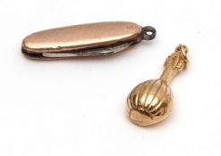 Mixed Lot: 9ct gold mandolin pendant/charm, together with a miniature folding knife, the case