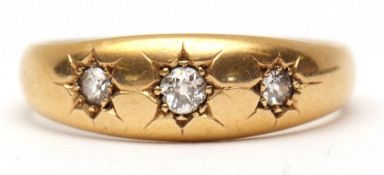 Early 20th century 18ct gold and diamond gipsy ring, having three graduated old cut diamonds, 0.20ct
