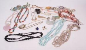 Box of costume jewellery to include various necklaces, bead necklaces, brooches etc