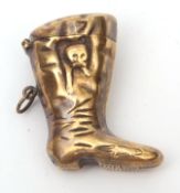 Late 19th/early 20th century brass vesta case modelled in the form of a boot with a cat chasing a