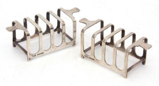 Two George V small four-slice toast racks, of rectangular form with applied and stepped side