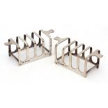 Two George V small four-slice toast racks, of rectangular form with applied and stepped side