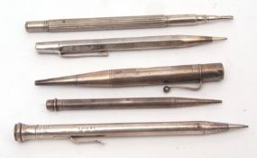 Mixed Lot: three various silver cased propelling pencils together with two further base metal