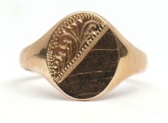 9ct gold gent's signet ring, the oval panel part engraved with a foliate design, 2.4gms, size O