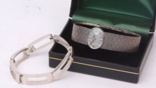 Late 20th century silver cased plated wristwatch, Rotary, the jewelled movement to a textured oval
