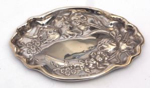 Edward VII dressing table pin tray of shaped oval form embossed with irises and other floral detail,