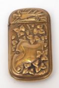 Early 19th century brass vesta case of hinged and sprung rectangular form and embossed with vacant