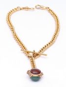 Vintage 9ct gold swivel fob, having three oval cabochon polished hardstones, each in a beaded collet
