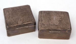 Mixed Lot: two various silver mounted table cigarette boxes, each of hinged and polished form with