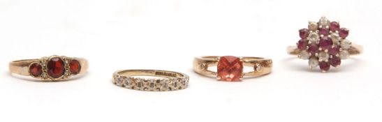 Mixed Lot: modern 9ct gold garnet and diamond ring, 9ct small seven stone diamond ring together with