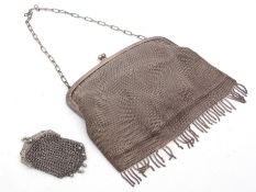 Early 20th century chain mail evening purse with hinged clasp and chain suspension and chamois lined