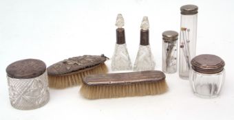 Mixed Lot: two various silver backed clothes brushes, two silver lidded toiletry jars, two silver