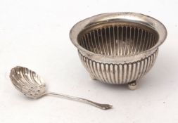 Victorian sugar bowl of fluted circular form on three ball feet, diam 8.8cms, Birmingham 1886,