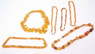 Mixed Lot: six vintage Bakelite amber coloured necklaces