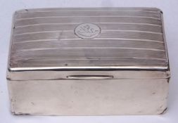 Early 20th century silver mounted table cigarette box of hinged and rectangular form with engine