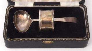 Cased George VI child's feeding spoon and napkin ring, combined wt approx 25gms, Birmingham 1941,