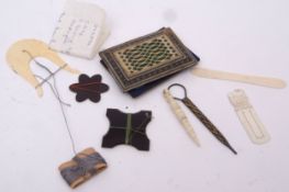 Mixed Lot: of sewing related items including an ivory lucet, darning needle holder, bone spatula,