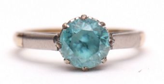 Modern blue zircon single stone ring, set in upswept shoulders, stamped 9ct, size J