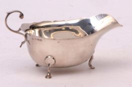 George V gravy boat with cut card rim, applied handle and feet, length 14 1/2 cms, weight approx