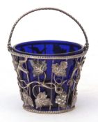 Early 19th century swing handled sugar basket, of wirework construction with rope twist borders