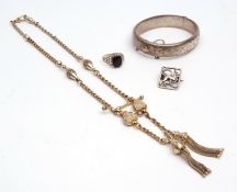 Mixed Lot: hallmarked silver hinged bracelet, part engraved, white metal and onyx panel ring, a