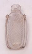 Late 19th century oval clear glass perfume flask, of oval form and with ribbed side panels and