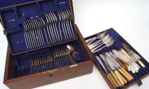 Mixed Lot: quantity of assorted flatware and cutlery, all contained within an oak Mappin & Webb -