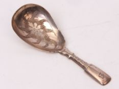 William IV Fiddle pattern caddy spoon, with hollow and initialled handle to a pear shaped and