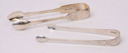 Mixed Lot: two various pairs of sugar tongs, including Bright Cut and Fiddle pattern examples,